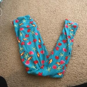 Lularoe Turquoise Seashell and Stars Leggings OS