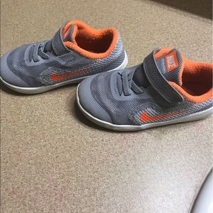 Grey & orange Nikes