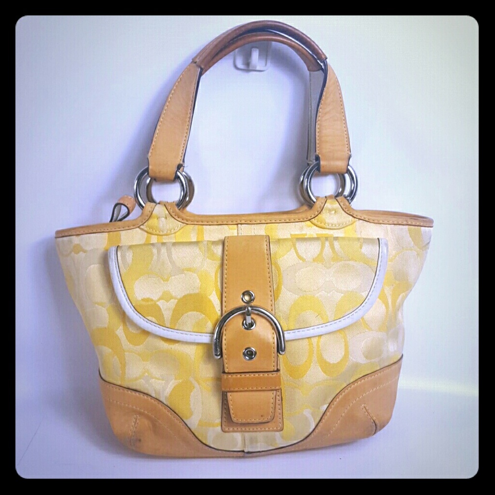 Small yellow and light brown Coach
