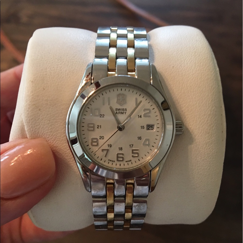 Victorinox silver and gold-filled watch.