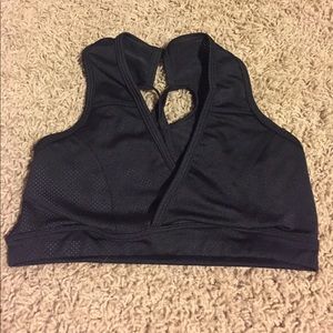 Black sports bra with back straps looped together