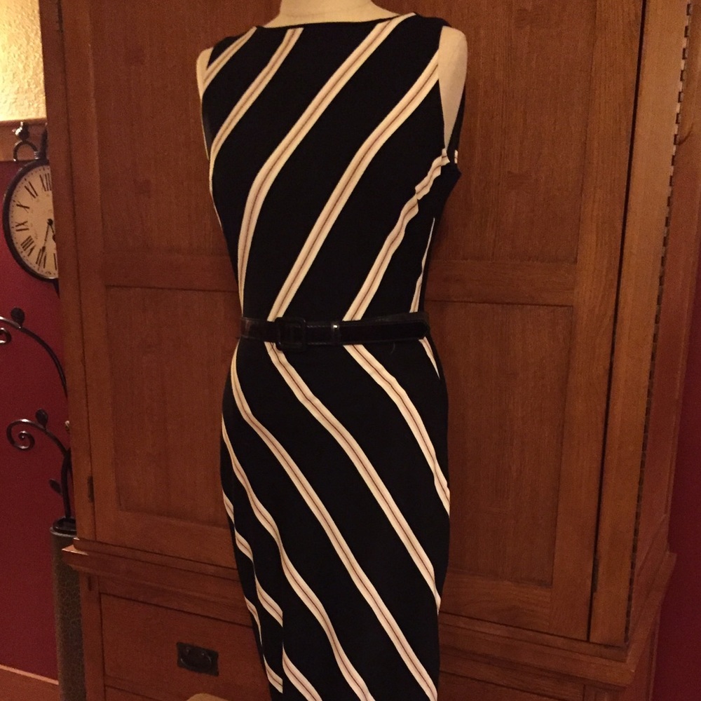 Sleeveless black dress with stripes