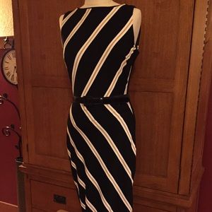 Sleeveless black dress with stripes