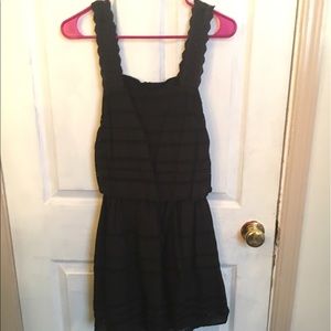 Black eyelet open back dress.