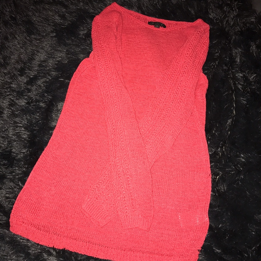 Pink/orange colored sweater