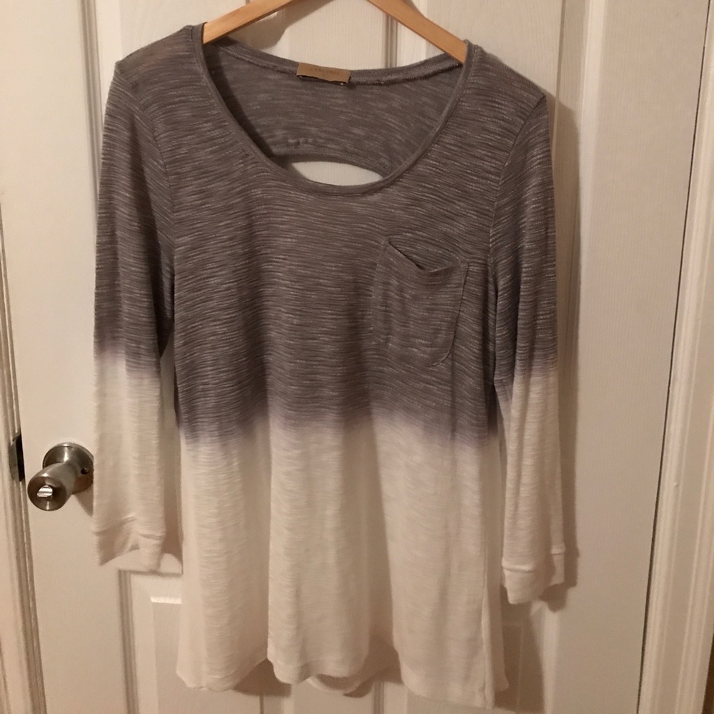 Language grey and white top