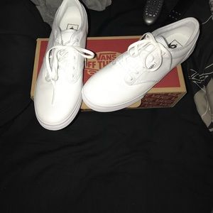 All white low pro vans