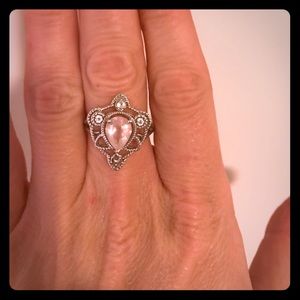 Silver ring with pink middle stone