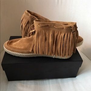 Barneys fringe suede moccasins. Boho chic.