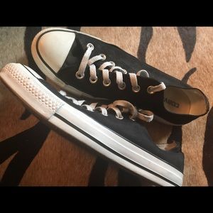 Black and white low top Chuck Taylor