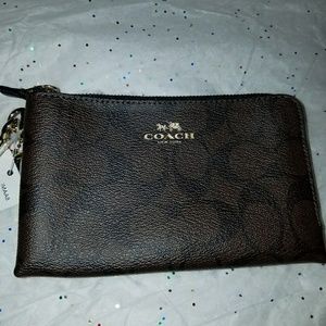 Coach Wristlet.  Never used,  with tags.