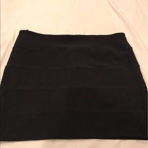 Black tight fitting skirt