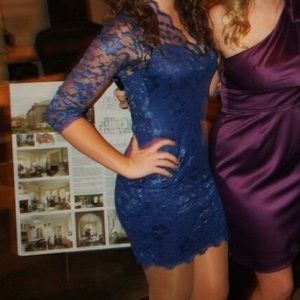 Blue bodycon lace dress.