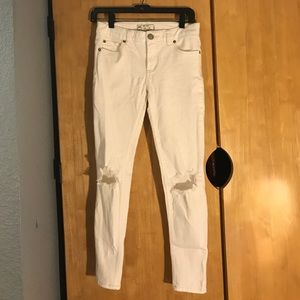 Free People White Jeans with rips