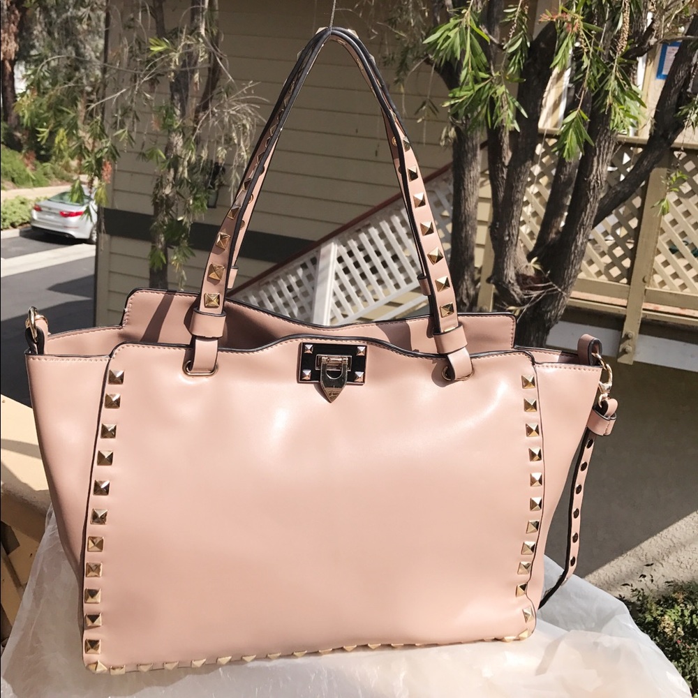 Studded leather handbag