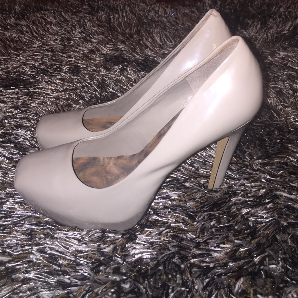 Grey platform pumps by Jessica Simpson