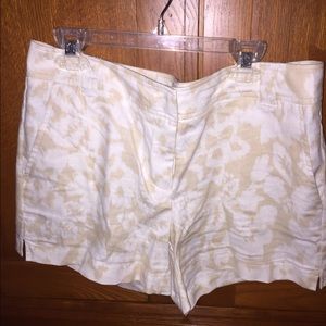 Khaki and white print shorts