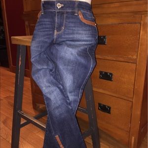 Jeans with leather trim.