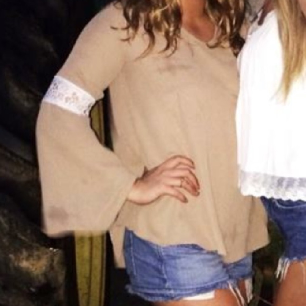 Nude flared out sleeves