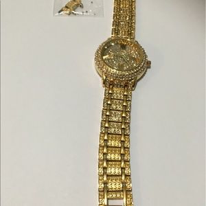 Women wrist watch gold plated with silver shine