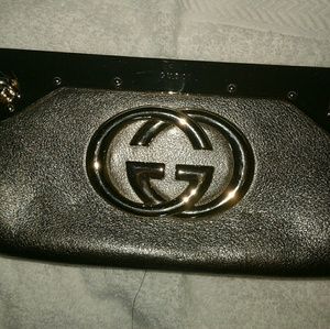 Gucci authentic gold leather clutch