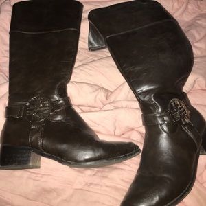Tall knee high brown leather boots