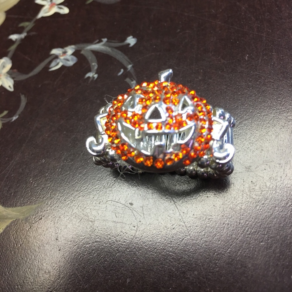 Pumpkin Stretch Ring. Orange and silver color.