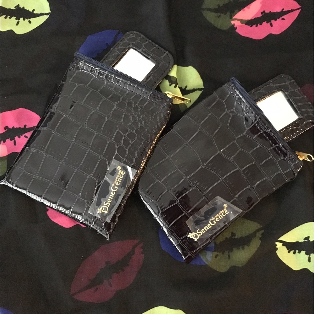 2 Lipsense lipstick cases with mirror.