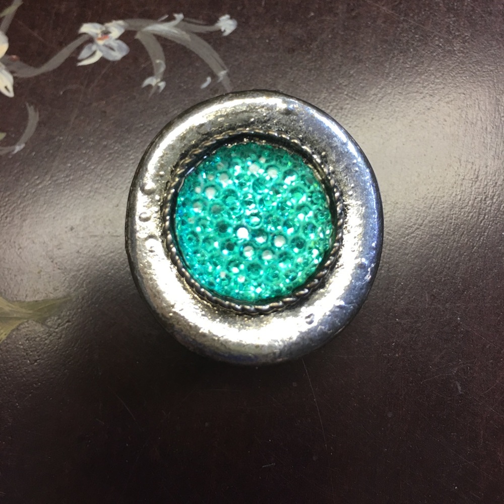Ring Stretches.  Round with Blue / Green Center