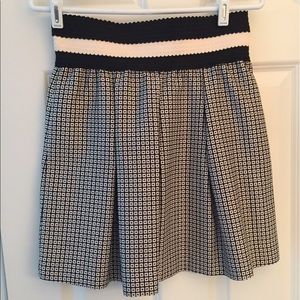 High waisted, pleated black & white skirt