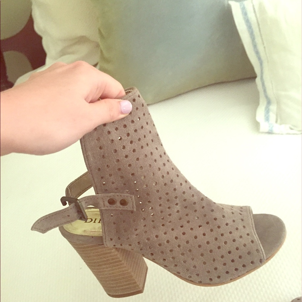 Never worn perforated heels !!!