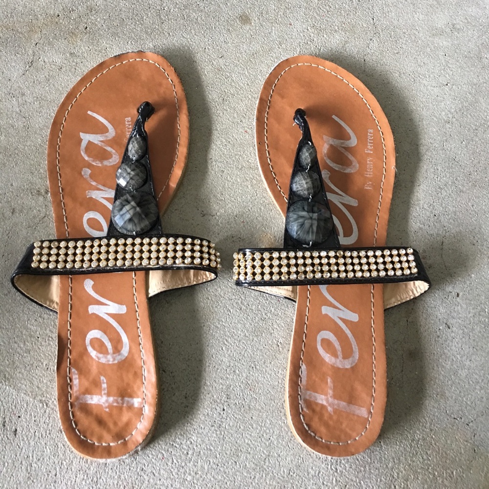 Ferrera black and gold sandals