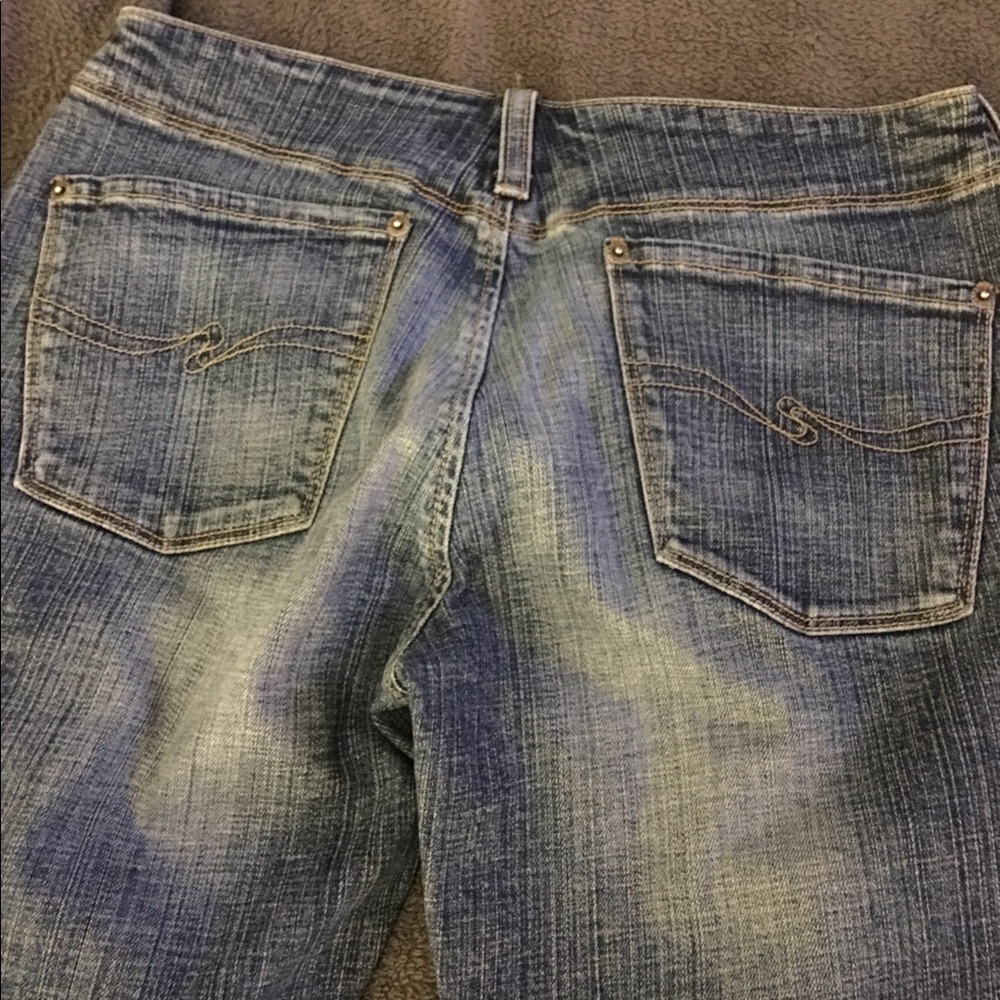 Silver brand medium wash jeans.  Size 27 waist