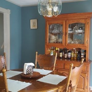 Dining room table, lighted hutch