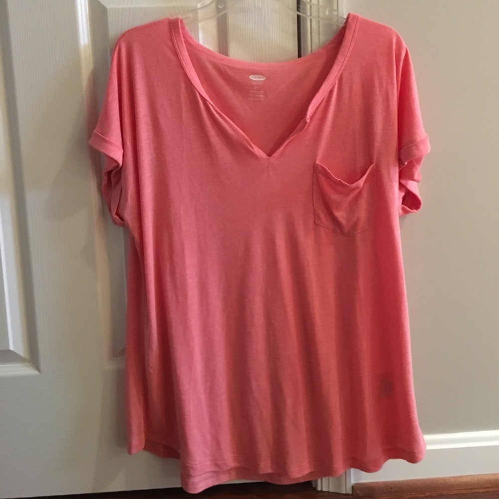 Salmon colored short sleeve shirt