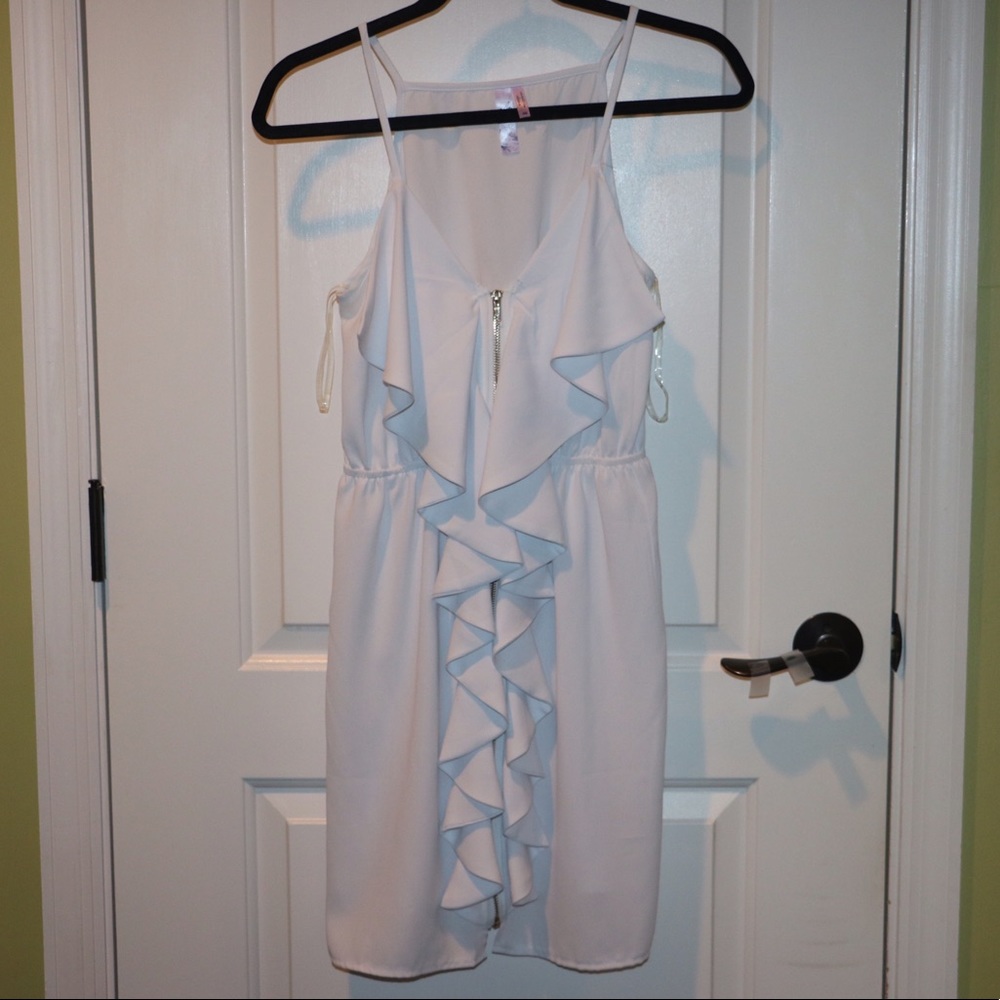 white slip dress with ruffle and zipper