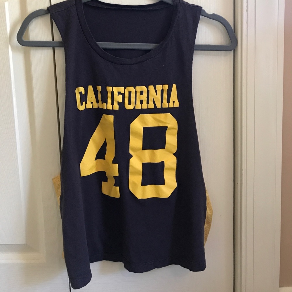 Trendy athleisure cut off tank top