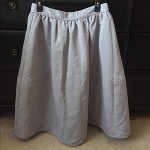 Long, light grey/blue skirt. Worn once.