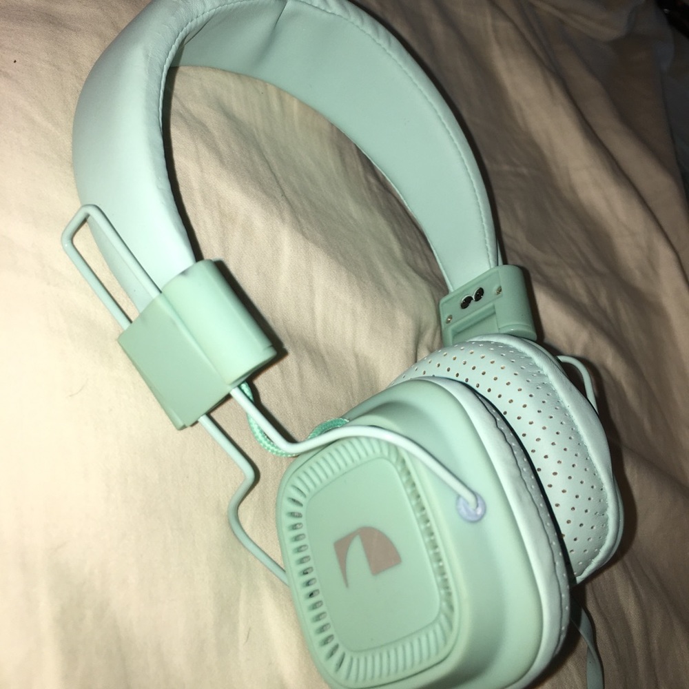 Mint green over the ear headphones