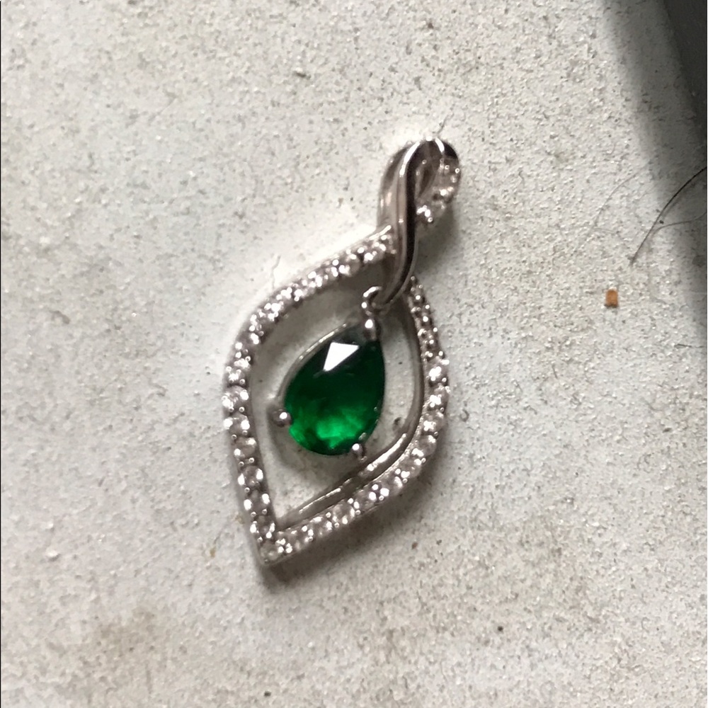 Diamond and emerald pendant