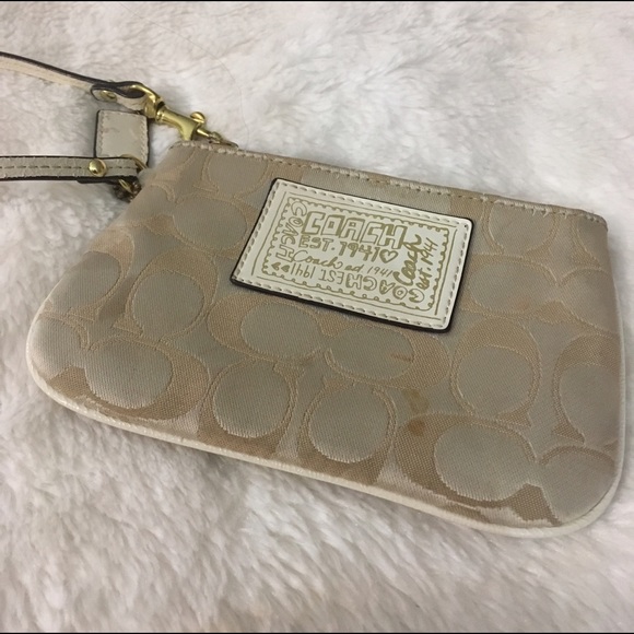 Coach Handbags - Coach Gold and Ivory Wristlet