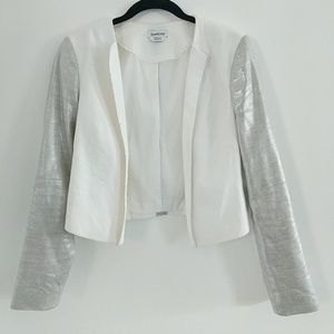 Silver-sleeved bebe blazer with slashed elbows