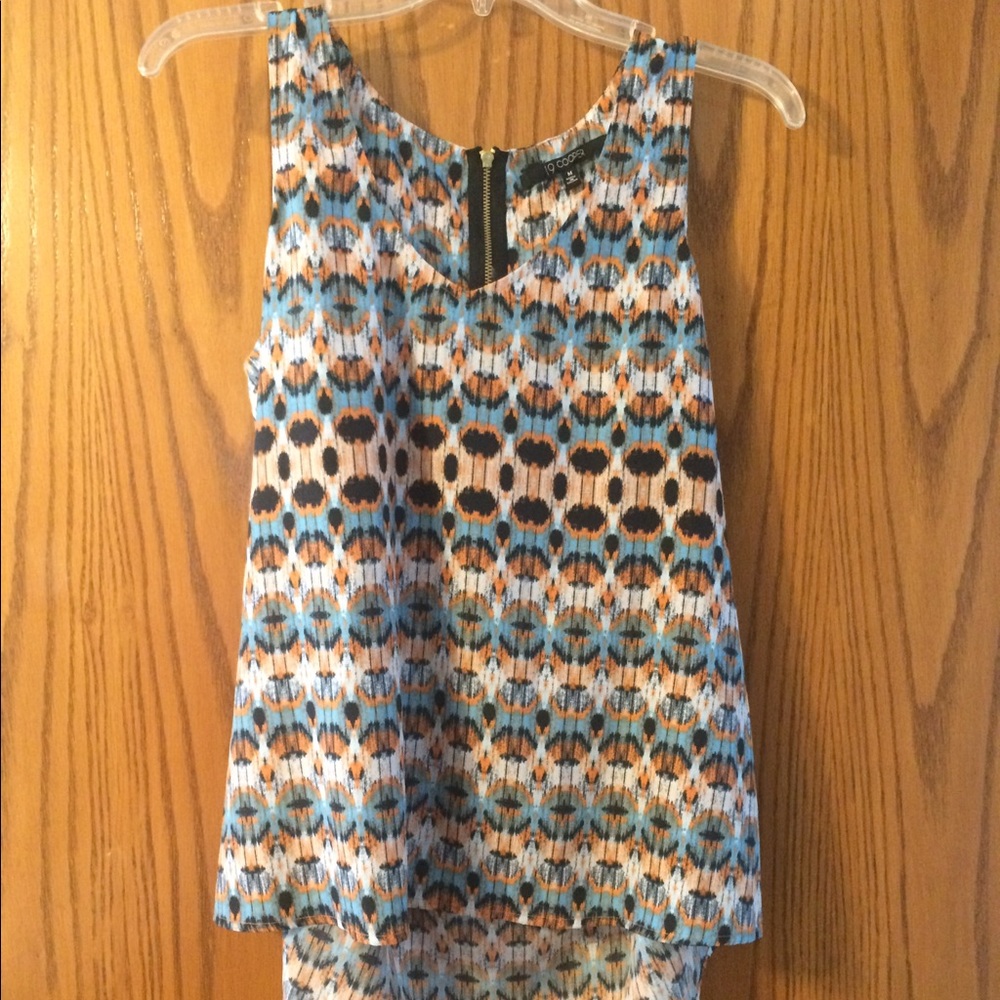 This is a medium blouse from 19 Cooper