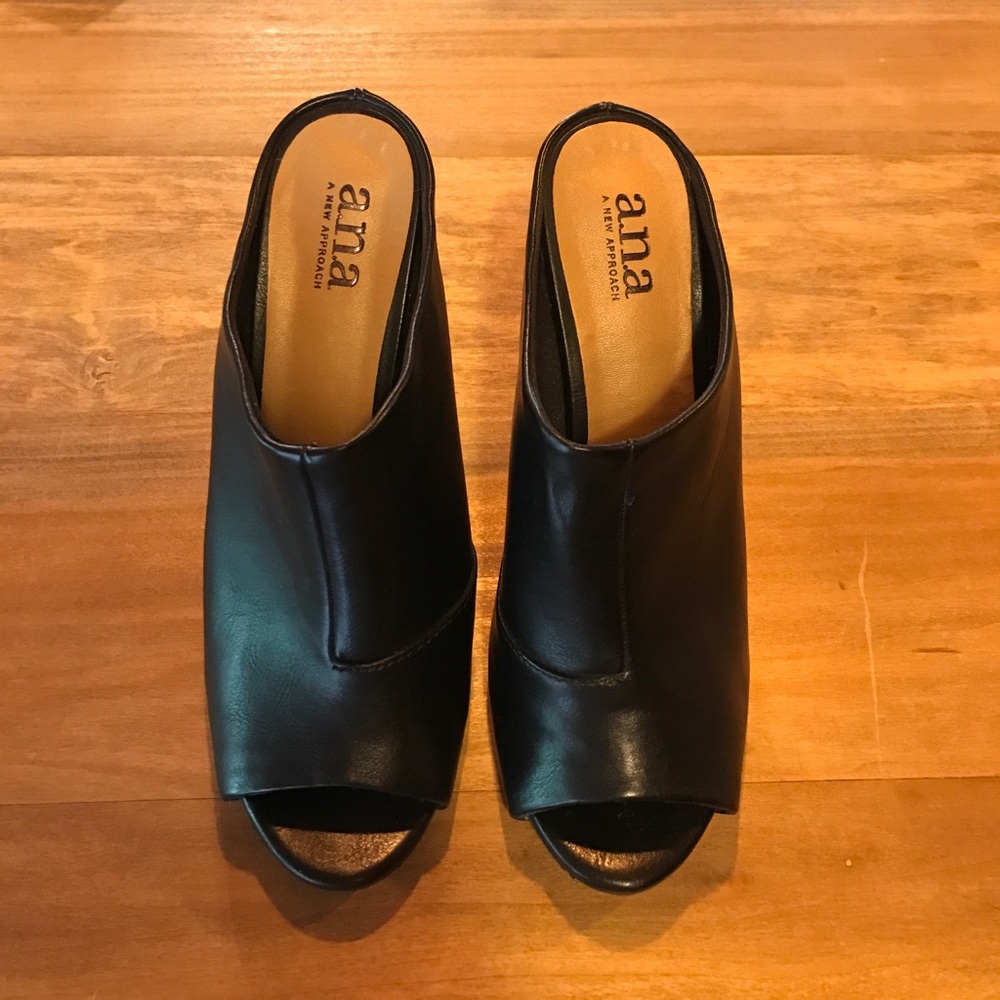 Black and tan a.n.a mules.