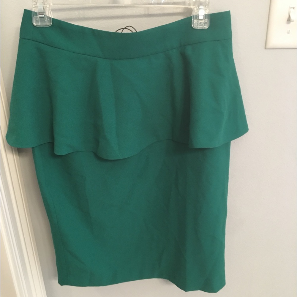 Adorable straight skirt with ruffle. New with tags