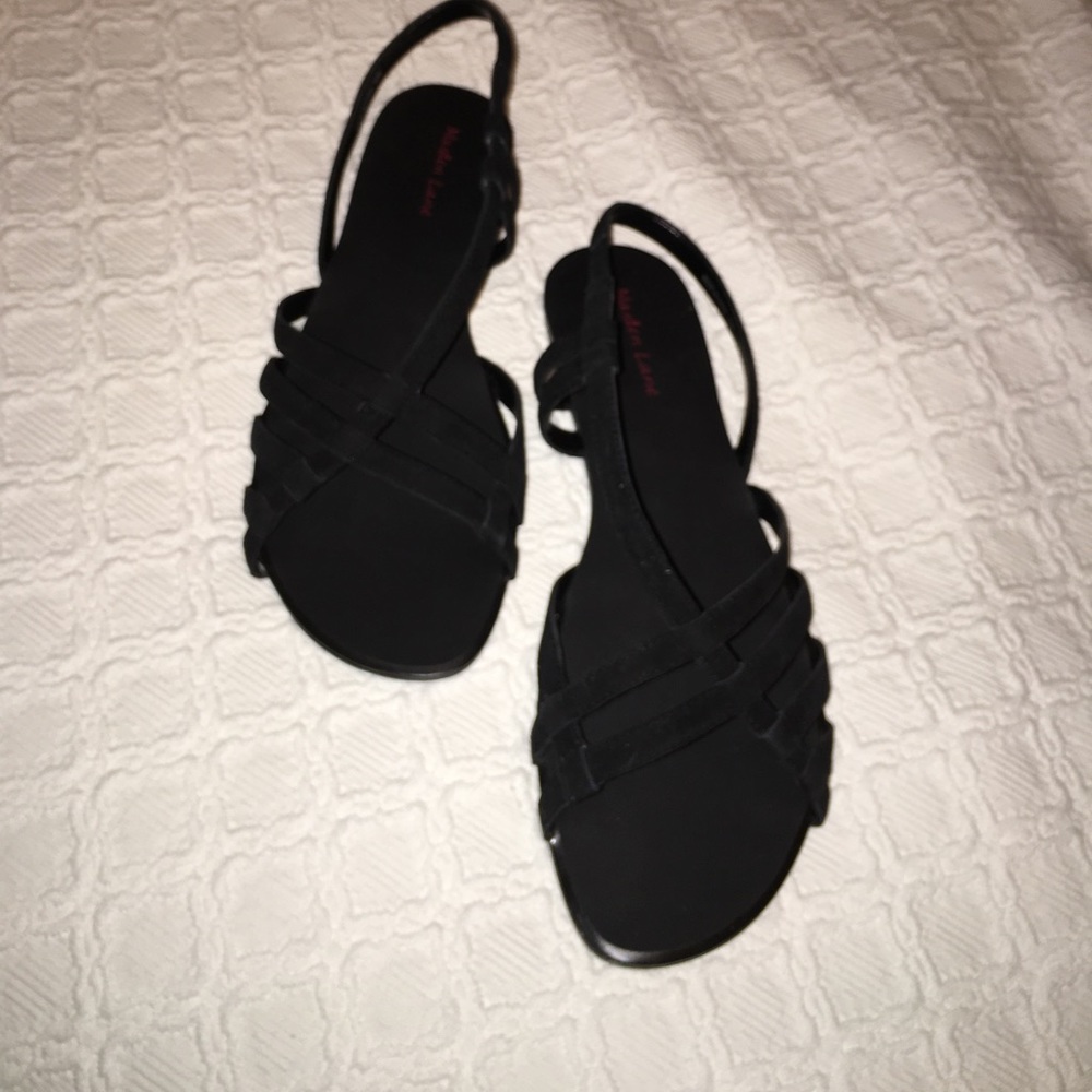 Black suede diagonal strapped with buckle closure