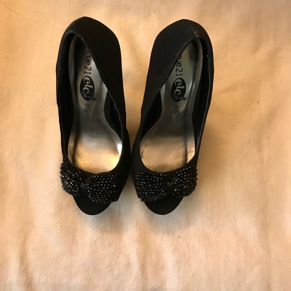 Black Rue21 etc. with sequined bow.