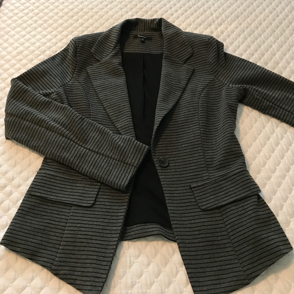 Gray jacket with black stripes.