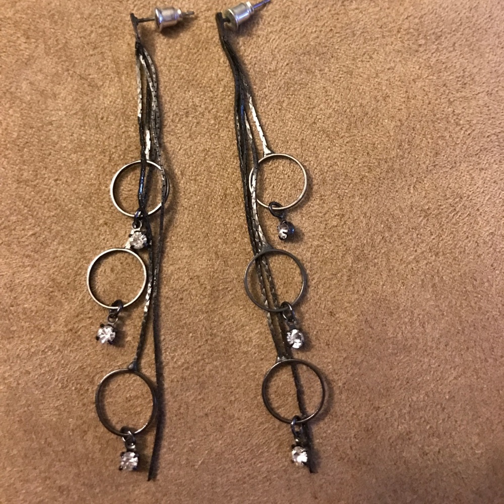 Gray tone gem earrings.