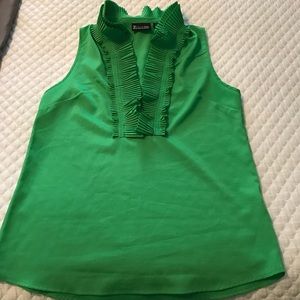Green sleeveless blouse